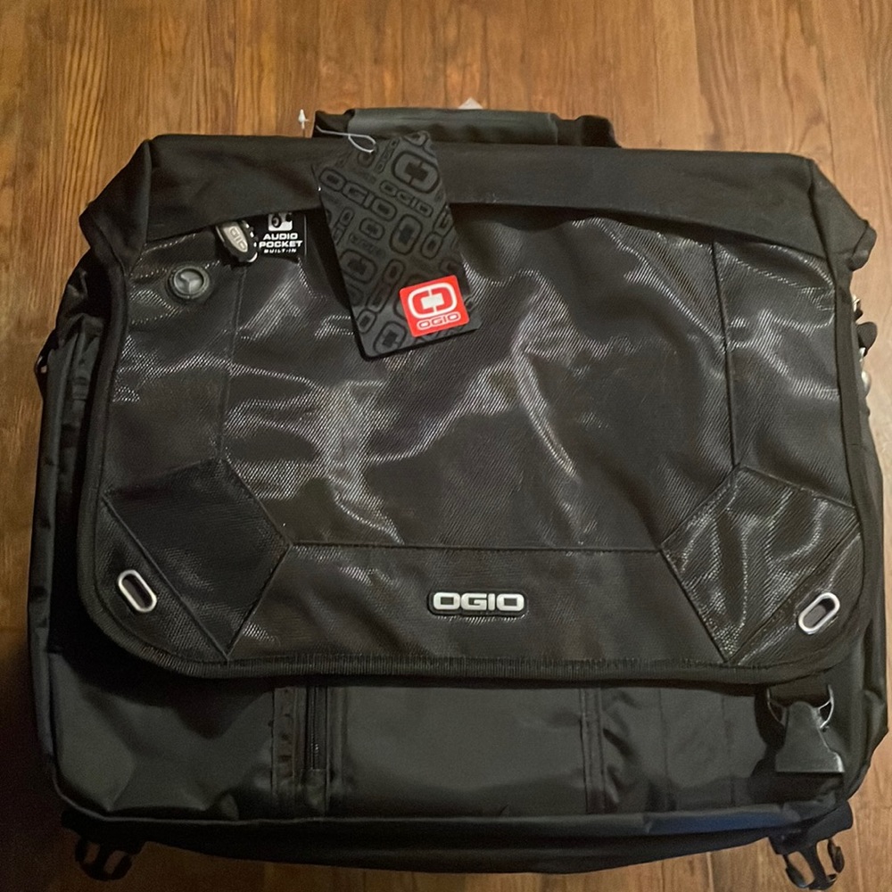 Ogio Laptop bag Brand New with tags. Holds a 15 inch laptop.